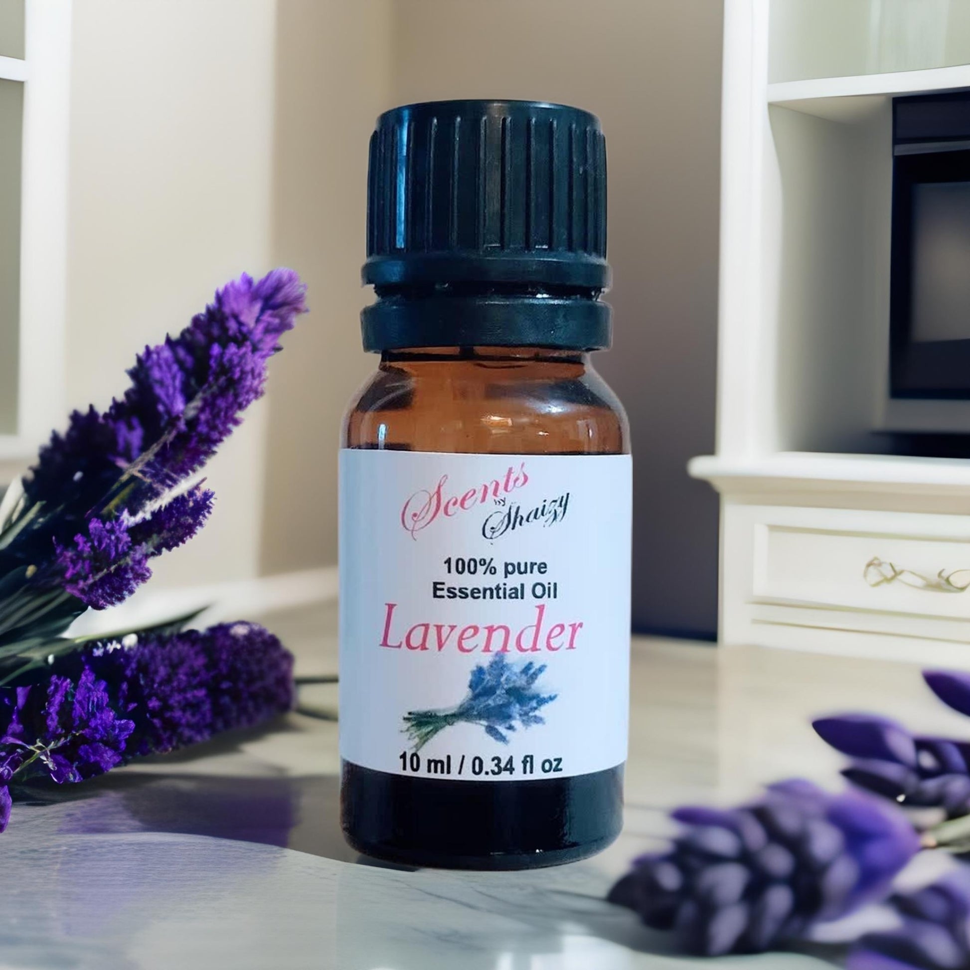 Lavender Essential Oil surrounded by flowers