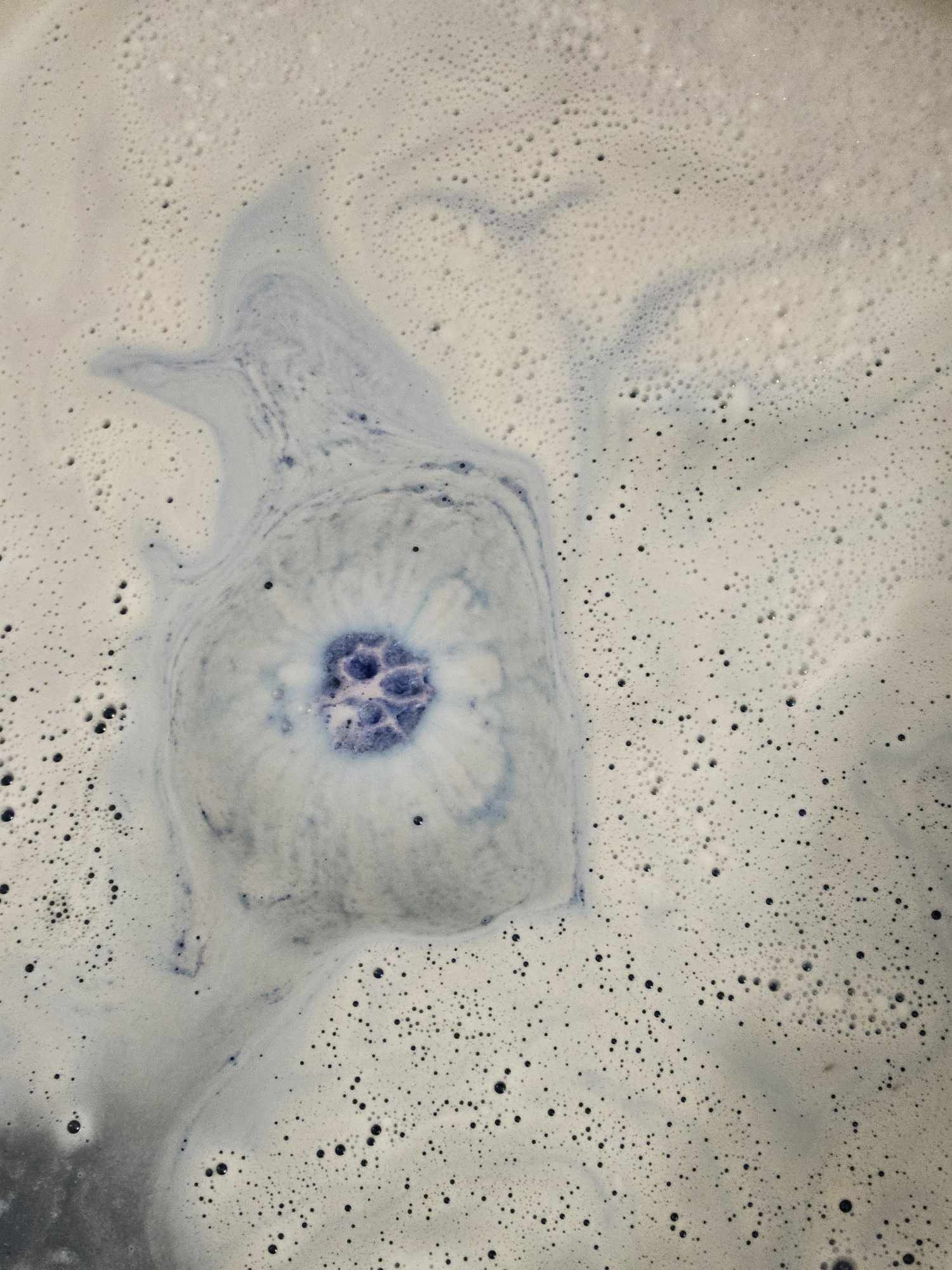 Color Bath Bomb Water in tub