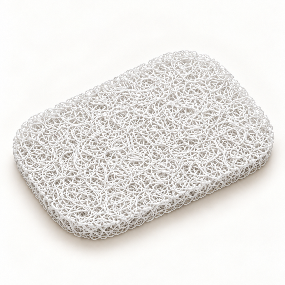 White rectangular soap saver pad with an open, porous texture on a white background.