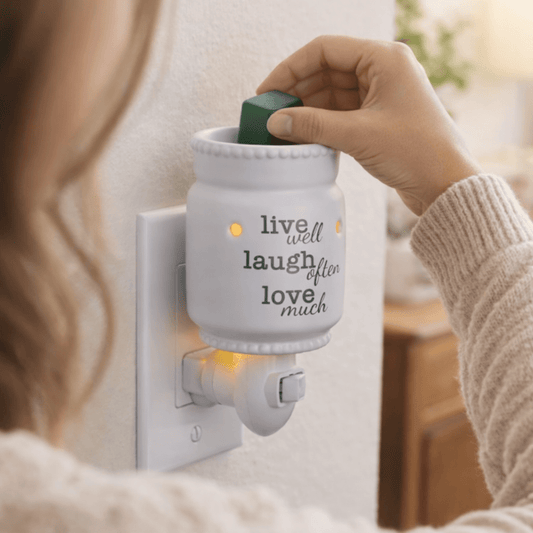 Ivory Pluggable Warmer Glowing with Wax Melts